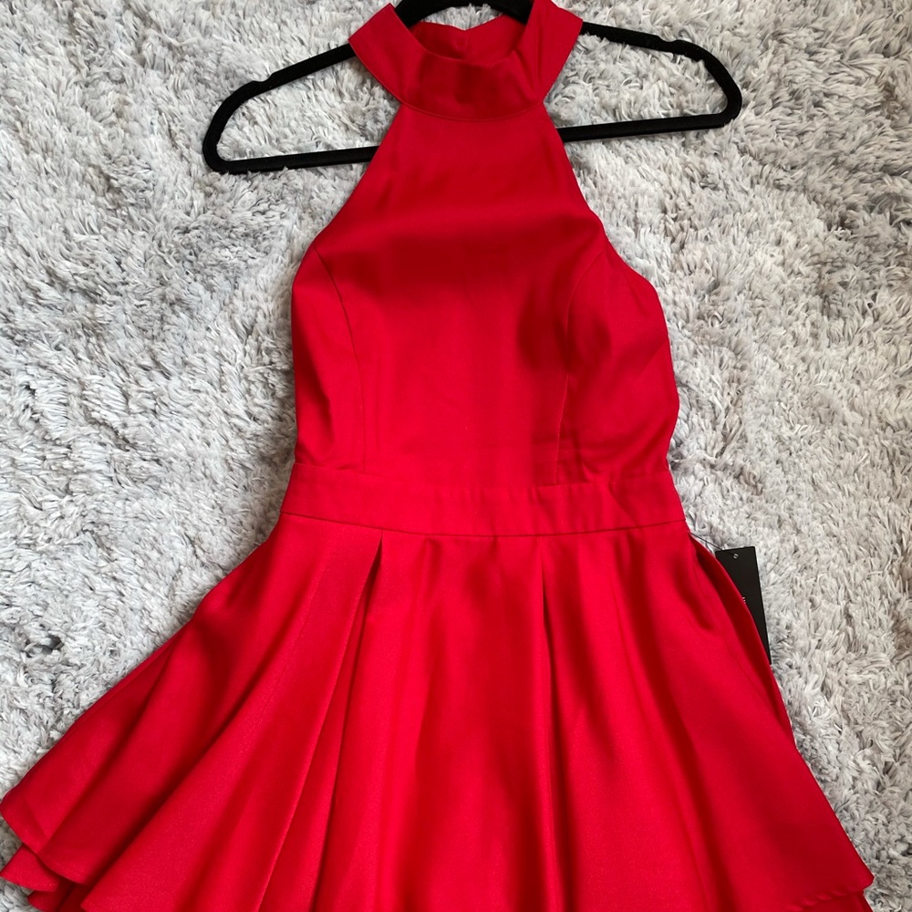 NEW Open back skater dress.